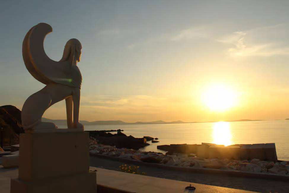 Naxos sunset view on greek statues on greek mythology and wine walking tour