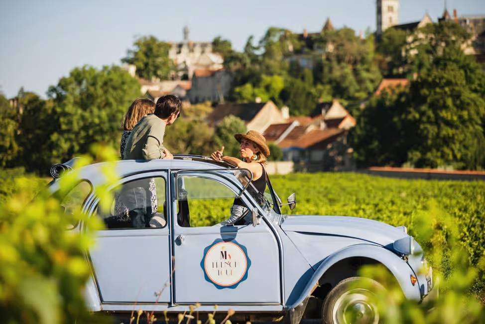 driving in the vineyards from Beaune with a 2CV classic car in Burgundy grands crus road tour