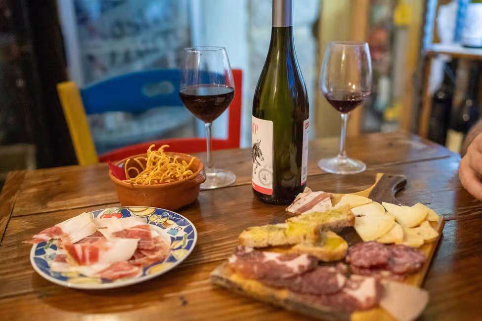 Local wines from Abruzzo and local cheeses, dry ham and salami for tasting at San Donato Val di Comino