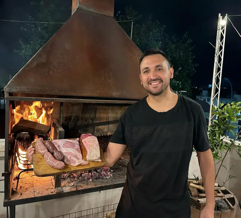 Local presenting asado meet in Mendoza, on a local tour with Malbec tasting